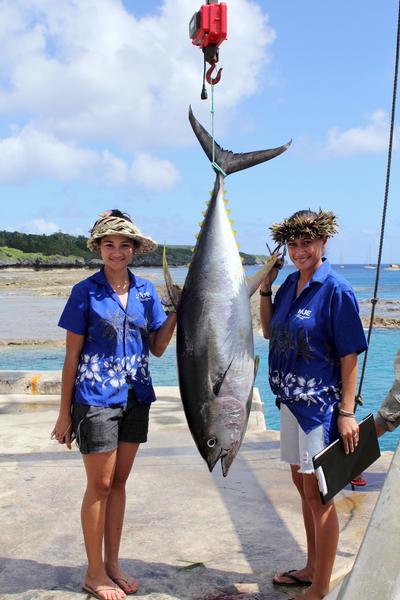 Weigh in team Vanessa Marsh & Pauline Rex with a 46.8kg Yellow fin Tuna caught by a local fisherman during the competition.