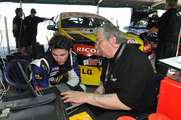 Working through changes to the setup of the 777 HPM Racing Ford, Australian Steve Owen discusses suspension adjustments with Paul Grimm.