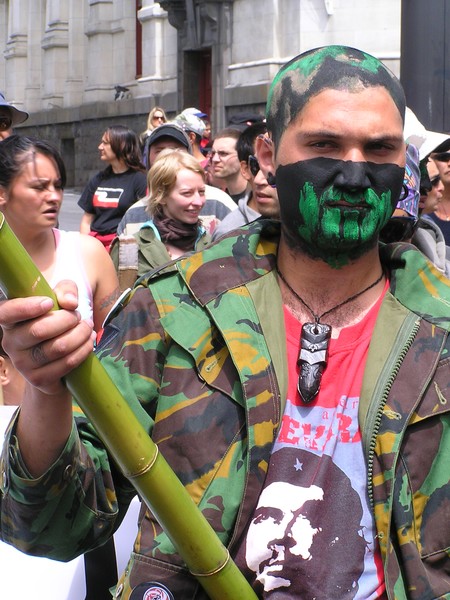 A protester at Aotea Square before marching to MT Eden