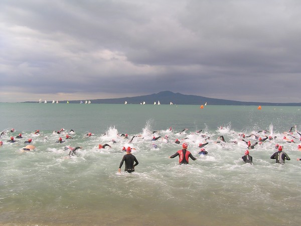 The men swim toward Ragitoto in race one of the Stroke and Stride 2007 - 2008