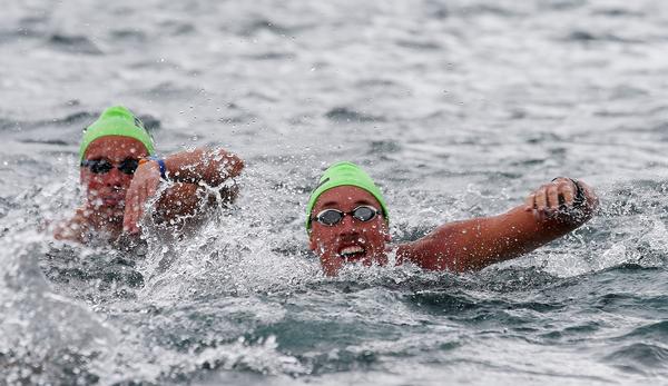 Kane Radford (right) and Japan's Yasunari Hirai in action in today's 5km open water race in Taupo.