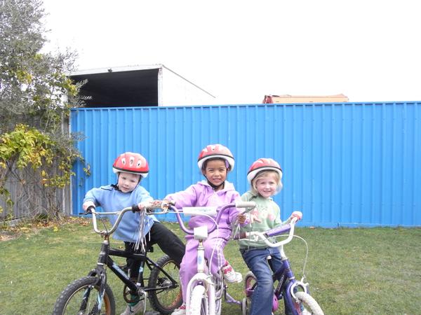 Jezze Ward-Cameron (4), Isabella Norman (4) and Summer Gurney (4) enjoying riding the new bikes while wearing iWay helmets,