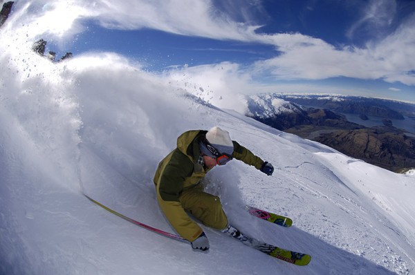 Skier enjoying fresh powder at Treble Cone