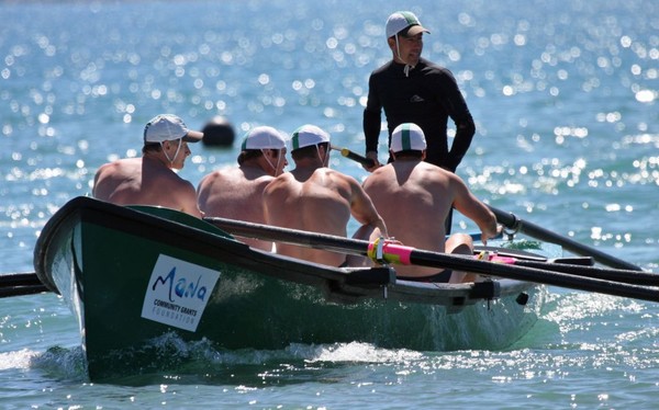 The Titahi Bay men's surf boat crew on their way to a win today