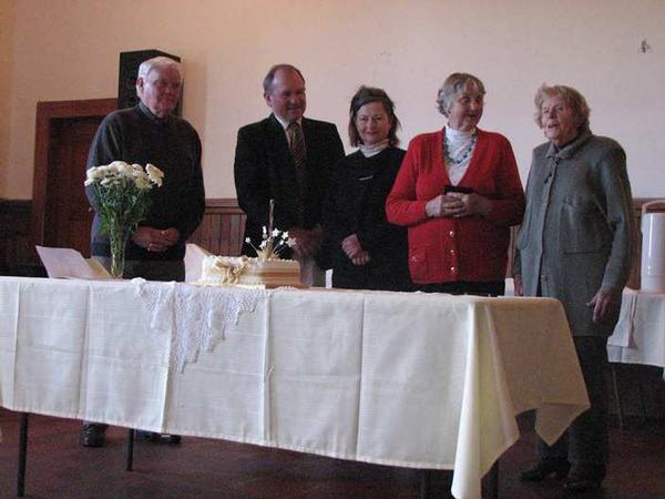 CELEBRATING the centenary are, from left, former District Councillor Don Beard; Rangitikei MP Ian McKelvie and wife Sue; hall committee chairperson Fran Rossiter and Better Willamson.