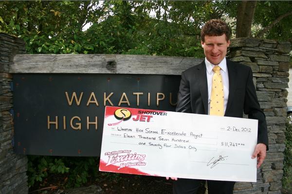 Wakatipu High School Principal Steve Hall with cheque from Shotover Jet  