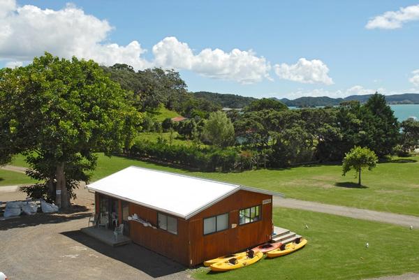 Camp Office and Kyaks:  Up for mortgagee sale &#8211; the future of the waterfront Whangaruru Motor Camp could be has a holiday home development.