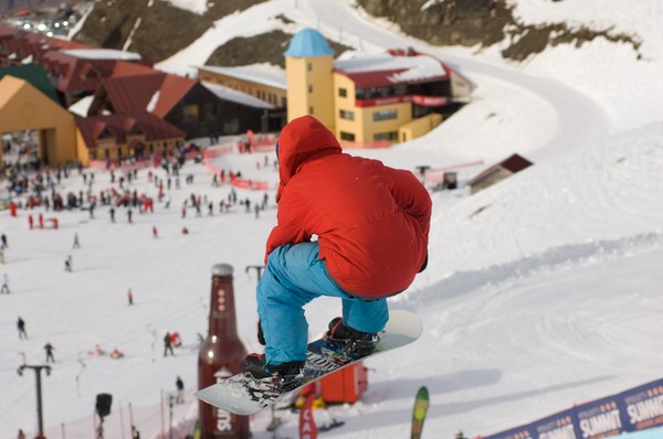 Halfpipe  Snowboarder overlooking learning area