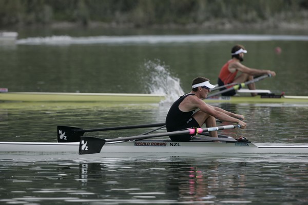 Grant fending off the late race challenge by Jaap Schouten of the Netherlands