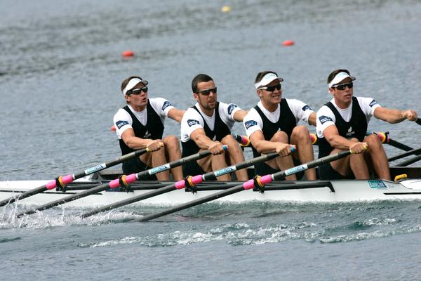 Men's quadruple scull charging home to win their race and qualify for the main semi finals