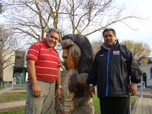 Master Carver Ted Ngataki (left) and Franklin District Council�s Te Roopu Paehere (Maori Committee) Chairman, Dennis Ngataki, prepare to remove the Papatuanuku carving in the Pukekohe Town Square in order to undertake restoration work.