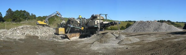 Concrete crushing machine at busy work at the Recycling Park on Te Tahi St, Whakatane.