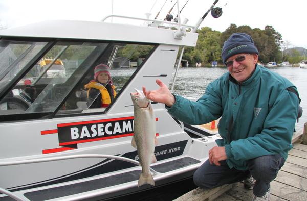 Hamilton man Stewart Hanna with the 1.75 kg rainbow he landed on Tarawera