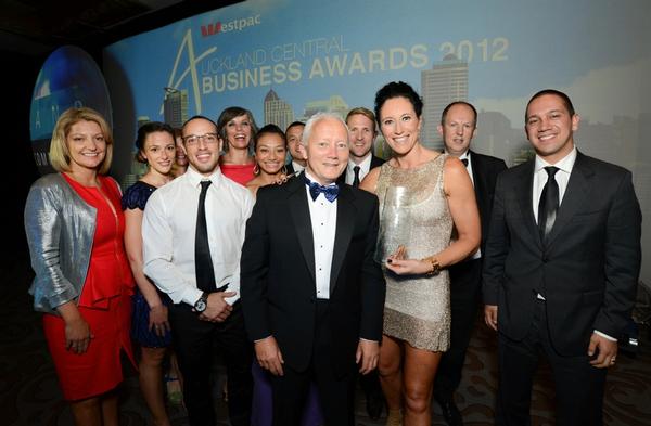 Auckland Chamber of Commerce chief executive Michael Barnett congratulates the team from Les Mills International &#8211; winners of the Westpac Supreme Business Excellence Award. 