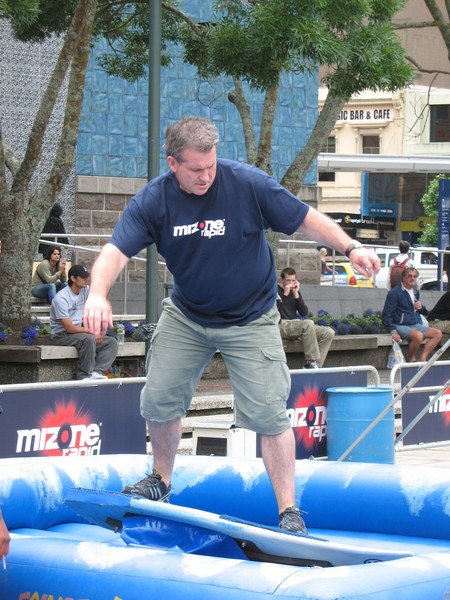 Hamish McKay takes on the mechanical surfboard at the Mizone Rapid Ultimate Sports Presenter 2007 