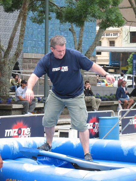 Hamish McKay takes on the mechanical surfboard at the Mizone Rapid Ultimate Sports Presenter 2007 