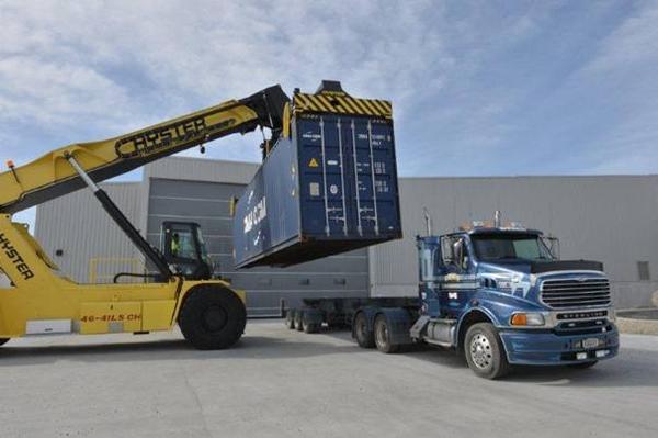 The first container of whole milk powder is loaded, bound for Lyttleton port and China.