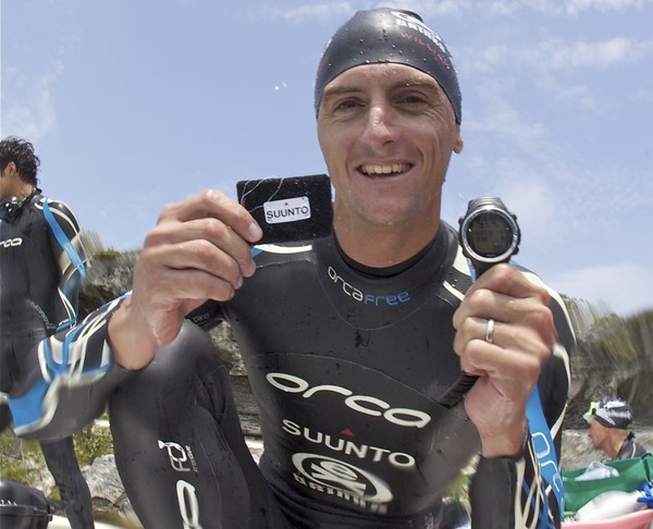  Will Trubridge (NZL) shows off his depth gauge and Velcro tag proving his new 95m world record freedive in the constant weight, no fins (CNF) discipline made at the Vertical Blue freediving competition on April 26, 2010.