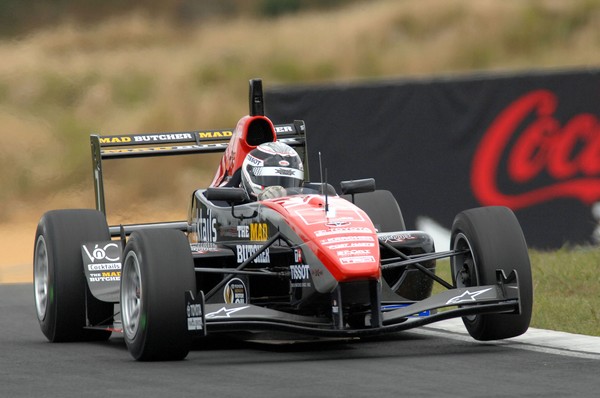 Triple X Motorsport driver Earl Bamber from Wanganui finished third during today's 15-lap race as build-up for the New Zealand Motor Cup, being held at the brand new Hampton Downs circuit .