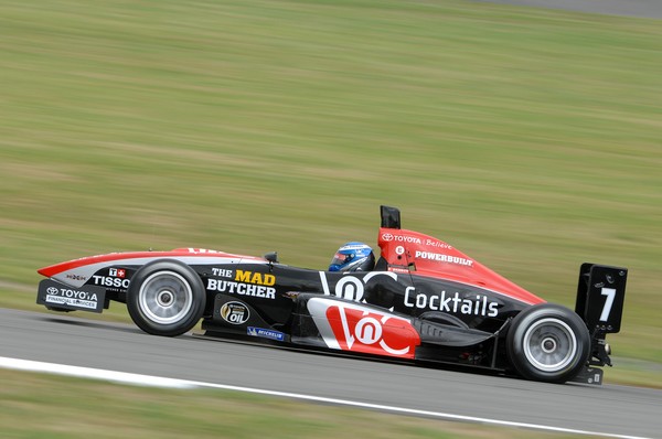 Victory: Triple X Motorsport driver Earl Bamber has entered the New Zealand history books by winning today's Grand Prix at Manfeild