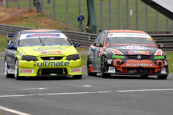 John McIntyre (left) duelling with Andy Booth (right) in todayÃ¢â‚¬â„¢s second NZ Truth V8s race