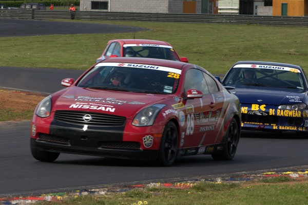 David Silverton holds off a hard charging Andrew Fox in the Nissan Sylvia