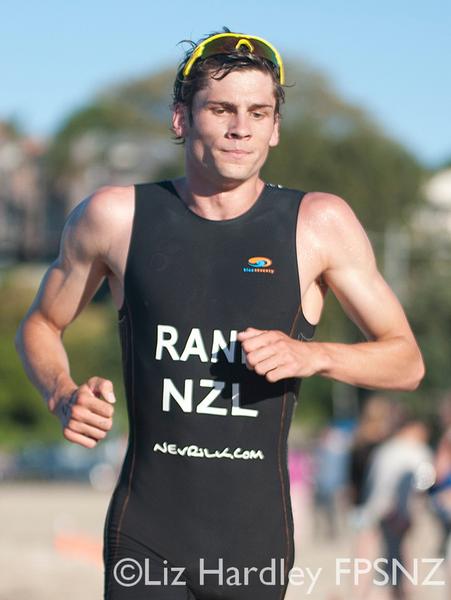 Race winner Cooper Rand crossing the finish line.