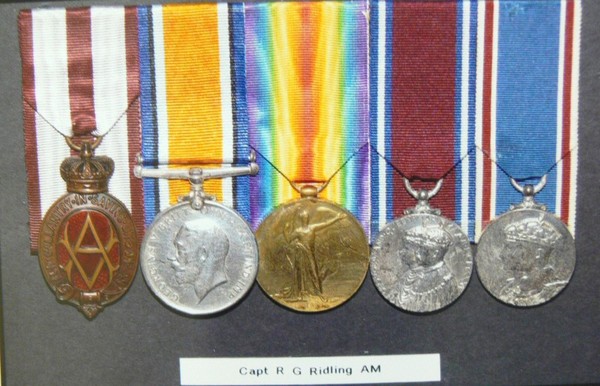 The medals of Capt Ridling AM. 