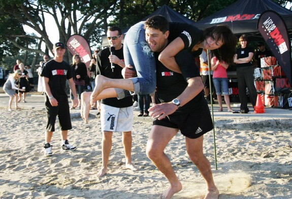 Auckland couple kick off the race in The Rocks Wife Carrying Competition for Valentines day in 2007 