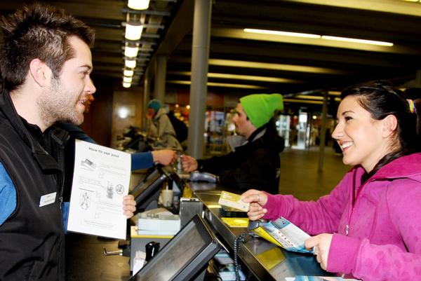 Coronet Peak guest learns about and loads her mypass for the day