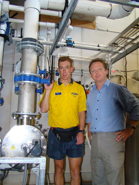 David Johnson from CLM and Gwyn De Arth from Franklin District Council with the new UV system at the Pukekohe indoor pool.