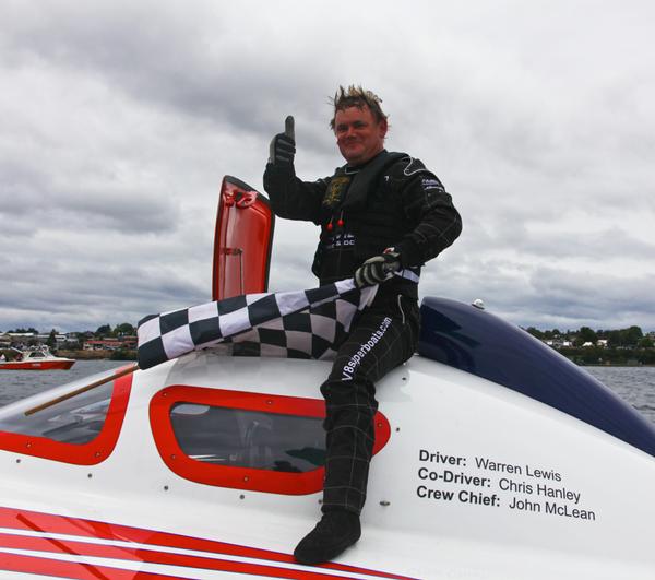 Warren Lewis winning driver of 'Fairview' receives the chequered flag at the 2011 event.