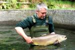 Fish & Game Officer Lloyd Gledhill with an 8kg tiger trout. 