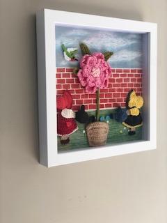 'Garden crochet' Mixed media (wool crochet and paint) a combined project by my wife (crocheting) and my daughter (painting).