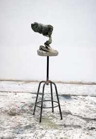 Curious thing 2011. Melted shopping bags, stool, cement, silt