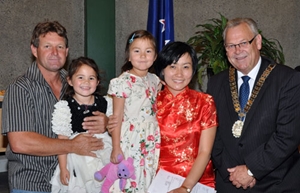 Mayor Alistair Sowman with one of Marlborough's newest citizens, Picton's Ting Thompson, with her husband Craig and daughters Tara and Jasmine after the latest citizenship ceremony at the Marlborough District Council Chambers.