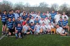 The teams gather for post-match celebrations.