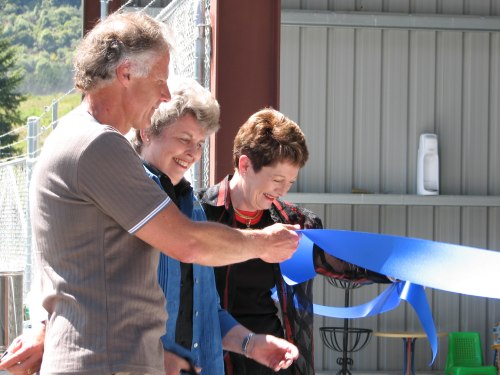 Cutting the ribbon to officially open the new Resource Recovery Centre