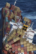 With the bow of the Rena perched on the reef, the stern section of the ship is over deeper water, and cracks on both sides of the hull, the ship is now twisted. 
