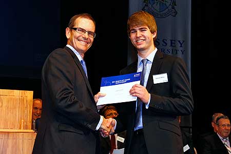 College of Business Pro Vice-Chancellor and Dean Professor Ted Zorn presents Sam White with his Dean's List certificate at the Academic Excellence Awards 2012.