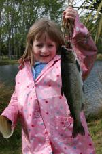 Angela Crutchley aged 7 of Bryndwr with a one pound salmon caught at last years Take A Kid fishing