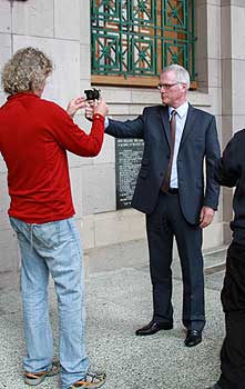 Vice-Chancellor Steve Maharey prepares to  film the tv ad on an iPhone, assisted by  Renaud Mare, Director of Photography.