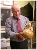 Warwick Smith, Director of the Forrester Art Gallery, with the beautifully carved gourd he was awarded at the Museums Aotearoa awards dinner