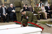 Corporal Willie Apiata VC lays a wreath at the gravesite of Lord Bernard Freyberg