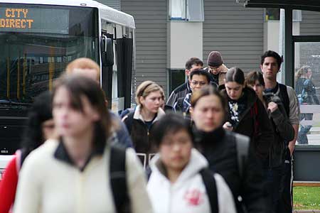 Students at the bus terminal.