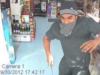 CCTV images of two men in connection to an aggravated robbery at the Thirsty Liquor bottle store in Upper Hutt. 