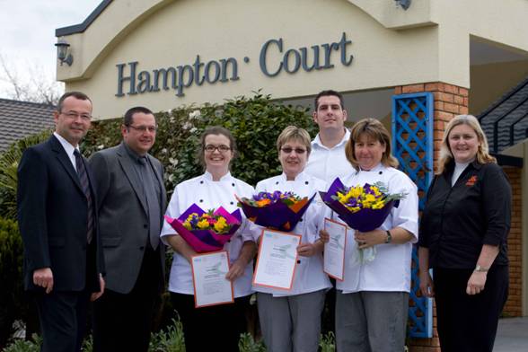 Radius Residential Care kitchen staff graduates Amanda Olsen, Therese Simpson & Wendy Bateman together with (from left to right) Steven Heesen & HSI training advisors Glyn Waterfield, Glenn Fulcher & Alison Thompson.