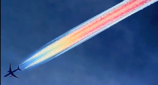 Photo credit: Weatherwars.Info.  Chemicals in aerosols can refract light.  A range of  colours may become visible. 