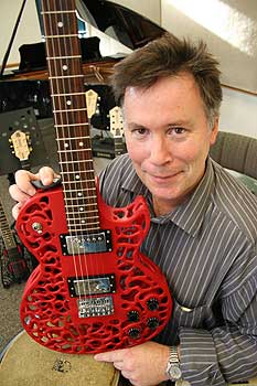 Professor Olaf Diegel with one of his 3D printed guitars.