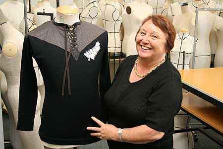 Tina Downes with a replica 1905 All Blacks rugby jersey
